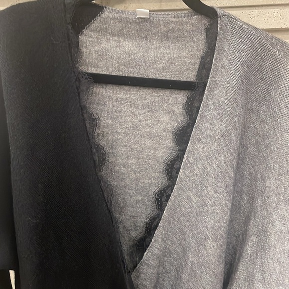 Black and grey lace trimmed criss cross thin sweater. Size large. Never worn. - Picture 3 of 6